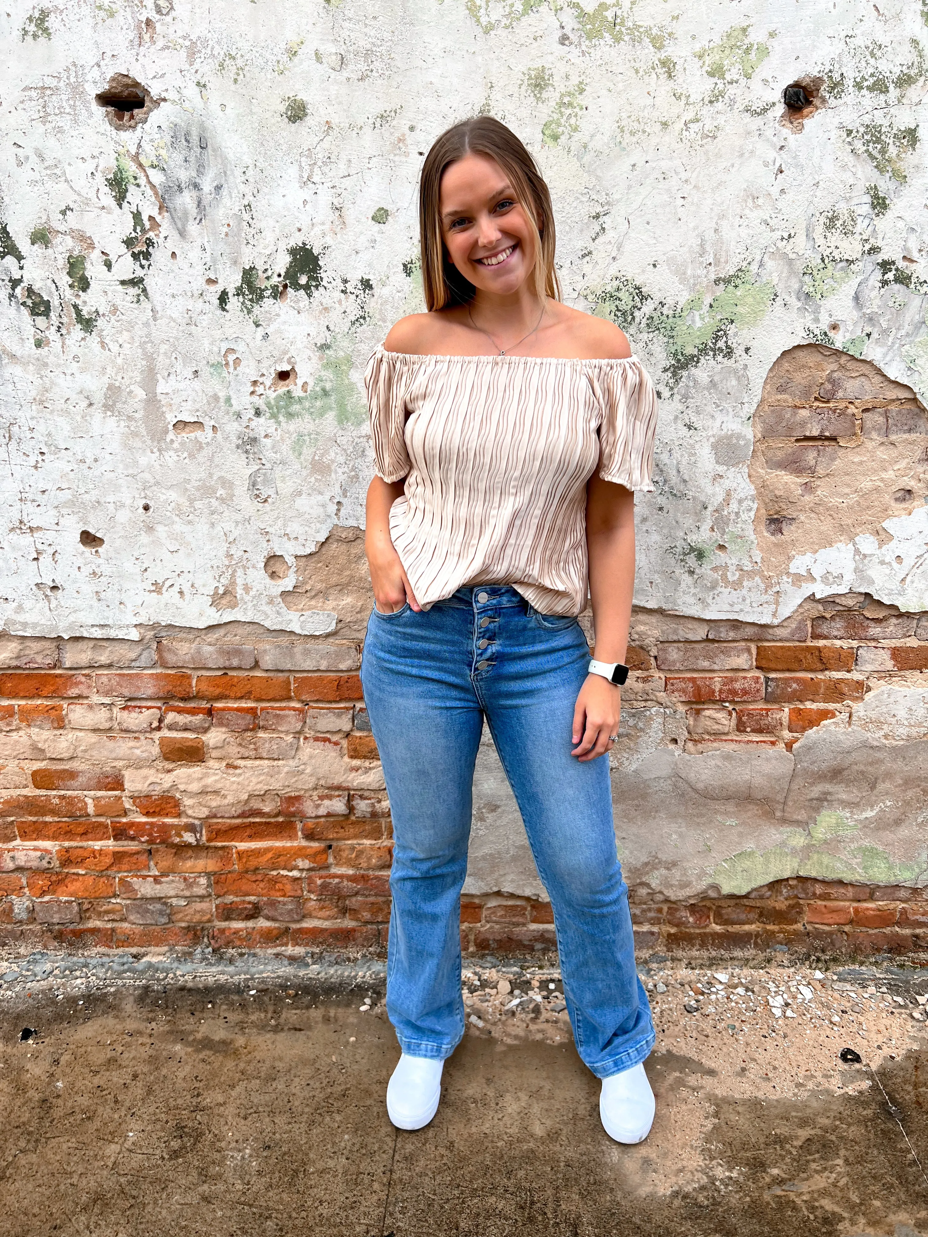 Alaia High Rise Button Down Boot Cut Jeans